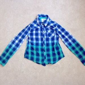 Blue, green, and silver plaid shirt.